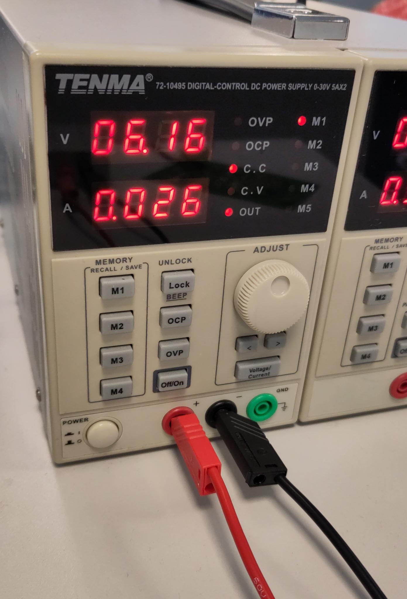 Lab supply set to a tight current limit, kicking in as soon as the board is connected